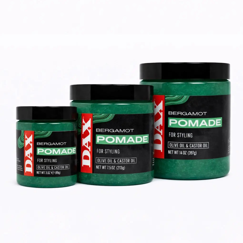 Boîte de pommade capillaire DAX verte aux huiles végétales.
